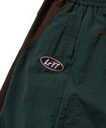 FILA × LFYT NYLON TRACK PANTS LA221202 BROWN