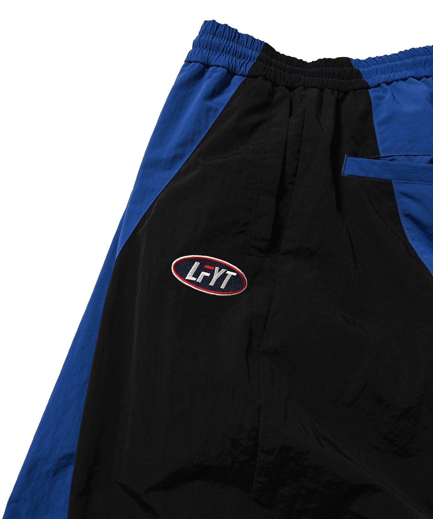 FILA × LFYT NYLON TRACK PANTS LA221202 BLUE